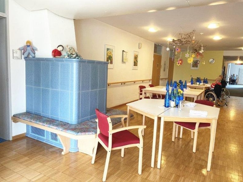 Wohnbereich 3 mit Kachelofen - für die Stationäre Pflege im St. Elisabeth Pflegeheim Senden